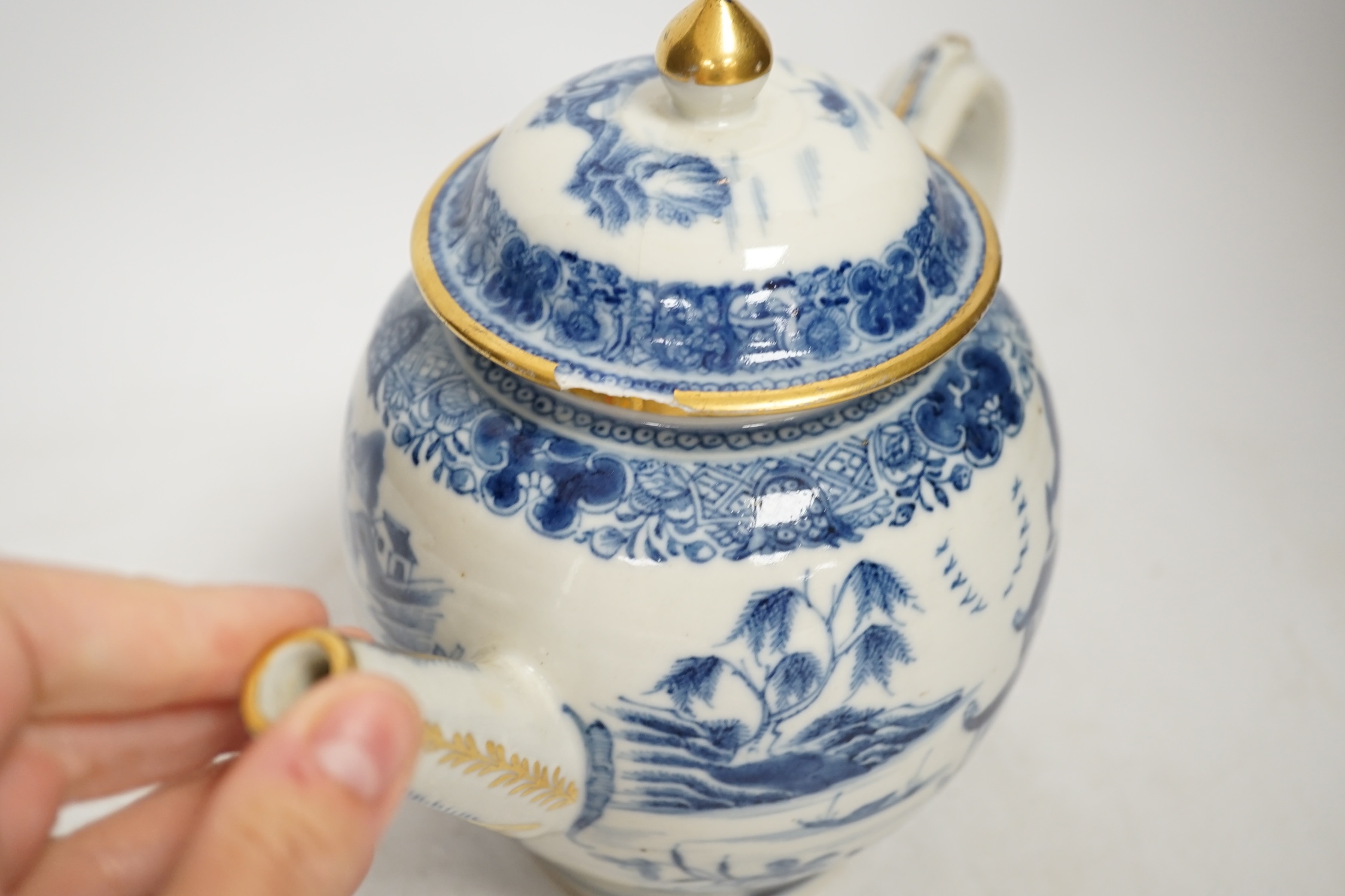 A Chinese blue and white teapot and cover, a prunus dish and an Imari patterned dish, all 18th century, teapot 19cm high. Condition - prunus dish and teapot cover chipped